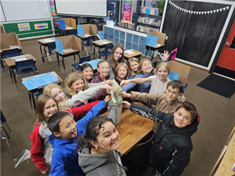 students posing in class
