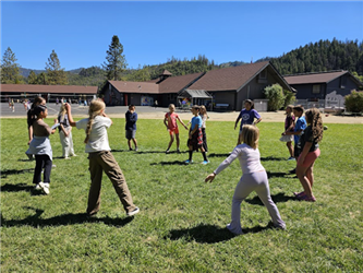 students dancing on the field
