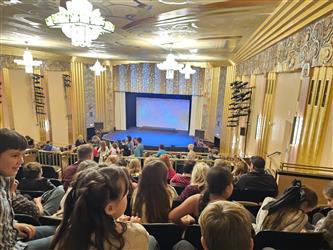 Students watching play
